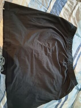 Woman Within Black Midi Skirt
